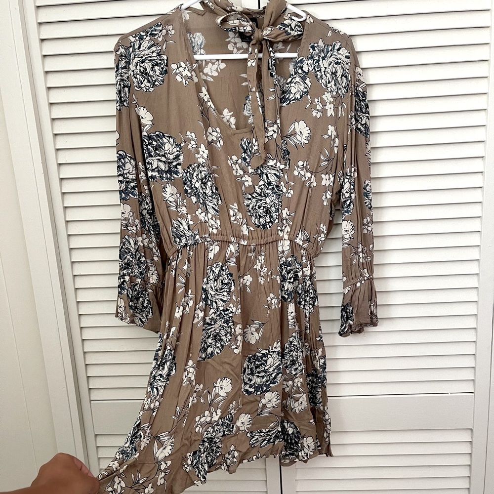 Angie tan floral dress.